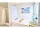 Bright bathroom featuring a soaking tub and walk-in shower at 3152 Andora Sw Trl, Marietta, GA 30064