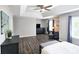 Large main bedroom with hardwood floors, ceiling fan, and sitting area at 3152 Andora Sw Trl, Marietta, GA 30064