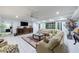 Finished basement with tile floors, a large sectional, and plenty of light at 525 Avala Ct, Johns Creek, GA 30022