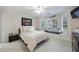 Cozy bedroom featuring a window seat and neutral decor at 525 Avala Ct, Johns Creek, GA 30022