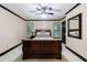Elegant bedroom featuring a large bed, classic black trim and plenty of natural light at 525 Avala Ct, Johns Creek, GA 30022