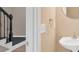 Powder room featuring a pedestal sink at 5705 Cannonero Dr Dr, Alpharetta, GA 30005