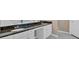 Bathroom featuring double sink and granite counters at 5705 Cannonero Dr Dr, Alpharetta, GA 30005