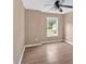 Bedroom with ceiling fan and window at 5705 Cannonero Dr Dr, Alpharetta, GA 30005