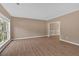 Open living room with hardwood floors and natural light at 5705 Cannonero Dr Dr, Alpharetta, GA 30005