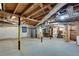 Unfinished basement with utilities, exposed beams, and ample room at 2689 Cosmos Ne Dr, Atlanta, GA 30345