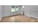 Bedroom with hardwood floors, a closet, and natural lighting at 2689 Cosmos Ne Dr, Atlanta, GA 30345
