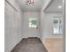 Inviting entryway with tile flooring and view into living spaces at 2689 Cosmos Ne Dr, Atlanta, GA 30345