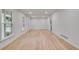 Spacious living room featuring light hardwood floors and natural light at 2689 Cosmos Ne Dr, Atlanta, GA 30345