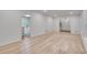 Open-concept living room with hardwood floors and abundant natural light at 2689 Cosmos Ne Dr, Atlanta, GA 30345