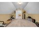 Bright bonus room featuring neutral walls and carpet, a window, and exercise equipment at 441 Belgrave Ln, Tucker, GA 30084