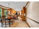Inviting dining area with access to the deck and open to the kitchen at 441 Belgrave Ln, Tucker, GA 30084
