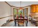 Bright dining area with bay windows and view to deck at 441 Belgrave Ln, Tucker, GA 30084