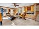 Comfortable living room with plush seating, wet bar and lots of natural light at 441 Belgrave Ln, Tucker, GA 30084