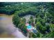 Aerial view of community amenities including pool, tennis courts, and lake access at 218 Oakmoor Ct, Lawrenceville, GA 30043