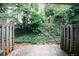 A quaint outdoor patio area surrounded by mature trees at 3101 Reeves Se St, Smyrna, GA 30080