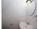 A cozy half bathroom features a corner sink with chrome faucet and a round mirror at 3101 Reeves Se St, Smyrna, GA 30080