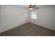 Neutral bedroom featuring a ceiling fan and a bright window at 3101 Reeves Se St, Smyrna, GA 30080