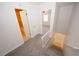 Upstairs hallway provides access to the bedrooms and bathroom at 3101 Reeves Se St, Smyrna, GA 30080