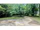 Green backyard with potential for outdoor activities and gardening at 5177 Mccarter Sta, Stone Mountain, GA 30088
