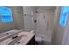 Clean bathroom featuring a walk-in shower and vanity sink with great lighting at 5177 Mccarter Sta, Stone Mountain, GA 30088