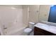 Bright bathroom features a tub and shower combo, and vanity sink with great lighting at 5177 Mccarter Sta, Stone Mountain, GA 30088