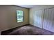 Comfortable bedroom with natural light and closet, ready for you to move in at 5177 Mccarter Sta, Stone Mountain, GA 30088