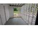 Enclosed porch with lattice design, perfect for enjoying the outdoors in comfort at 5177 Mccarter Sta, Stone Mountain, GA 30088