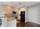 Efficient kitchen featuring granite countertops, stainless steel appliances, and hardwood floors at 905 Juniper Ne St # 701, Atlanta, GA 30309
