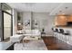 Stylish living room with hardwood floors, contemporary furniture, and an open layout to the kitchen at 905 Juniper Ne St # 701, Atlanta, GA 30309