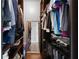 Well-organized walk-in closet with ample shelving, hanging space, and a full-length mirror at 905 Juniper Ne St # 701, Atlanta, GA 30309
