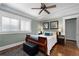 Charming bedroom with hardwood floors, natural light, and comfortable furnishings for a restful retreat at 1300 North Ne Ave, Atlanta, GA 30307