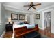 Comfortable bedroom features neutral colors, hardwood floors, ceiling fan and natural light at 1300 North Ne Ave, Atlanta, GA 30307