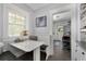 Cozy breakfast nook features a white marble table and comfortable bench seating at 1300 North Ne Ave, Atlanta, GA 30307