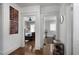Hallway showing hardwood floors and the entrances into different rooms at 1300 North Ne Ave, Atlanta, GA 30307