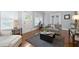 Cozy living room with hardwood floors, comfortable seating, and ample natural light at 1300 North Ne Ave, Atlanta, GA 30307