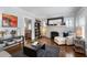 Bright living room with fireplace, hardwood floors, and comfortable seating at 1300 North Ne Ave, Atlanta, GA 30307