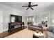 Cozy living room features hardwood floors, ceiling fan, and a comfortable gray sofa at 1300 North Ne Ave, Atlanta, GA 30307