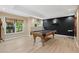 Spacious game room with a pool table, hardwood floors, and natural light at 1755 Noblin Summit Dr, Duluth, GA 30097