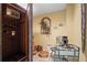 Wine cellar with storage rack, decorative art, tile floor, and dining table at 1755 Noblin Summit Dr, Duluth, GA 30097