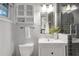 Clean bathroom with shower, vanity, and toilet, offering a refreshing space at 2070 Drew Valley Ne Rd, Brookhaven, GA 30319