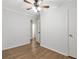 Bedroom with closet, ceiling fan, and hardwood floors, creating a comfortable ambiance at 2070 Drew Valley Ne Rd, Brookhaven, GA 30319