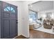Inviting living room featuring modern furnishings, hardwood floors, and plenty of natural light at 2070 Drew Valley Ne Rd, Brookhaven, GA 30319