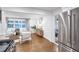 Bright living room with hardwood floors, large windows, and stylish furnishings for a comfortable and inviting atmosphere at 2070 Drew Valley Ne Rd, Brookhaven, GA 30319