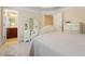 Bedroom featuring a bed, vanity, and access to bathroom creating a comfortable and convenient private space at 4879 Seldon Se Way, Smyrna, GA 30080