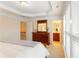Bedroom featuring a dresser, ensuite bath, and neutral color palette at 4879 Seldon Se Way, Smyrna, GA 30080