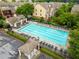 Inviting community pool with lounge chairs and shaded areas, perfect for relaxation and recreation at 4879 Seldon Se Way, Smyrna, GA 30080