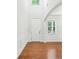 Bright and spacious foyer with hardwood floors, white trim, and a welcoming atmosphere at 1648 Danbury Parc Ne Pl, Brookhaven, GA 30319