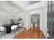 Elegant foyer with hardwood floors, arched doorways, and a view into the dining and living areas at 1648 Danbury Parc Ne Pl, Brookhaven, GA 30319