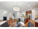Open-concept kitchen featuring granite countertops, stainless steel appliances, and hardwood floors at 1648 Danbury Parc Ne Pl, Brookhaven, GA 30319